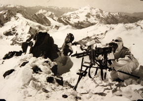 German mountain soldier with MG 34 machine gun mounted on a Lafette 34 tripod, date unknown