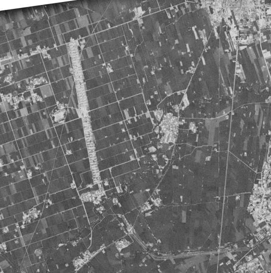 CORONA satellite view of the remains of the primary runway of Soton Airfield, Caotun, Nantou, Taiwan, 18 Jun 1951; note housing for displaced flood victims on the runway surface