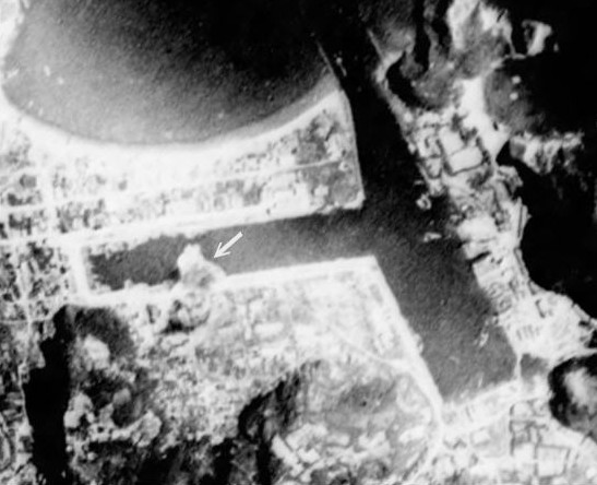 Harbor under attack by a PB4Y-1 aircraft of US Navy VPB-104 squadron, Suo, Taihoku Prefecture (now Su'ao, Yilan County), Taiwan, 24 Jun 1945, photo 3 of 3