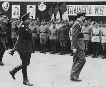 King Mihai I of Romania and commanding officer of Tudor Vladimirescu Division General Nicolae Cambrea reviewing troops of the Tudor Vladimirescu Division, Bucharest, late Aug 1944