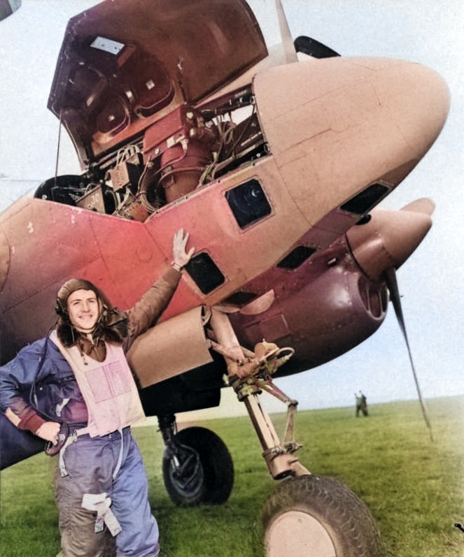 Good view of the camera compartment and the reconnaissance camera in an F-5 Lightning. Date and location unknown. [Colorized by WW2DB]