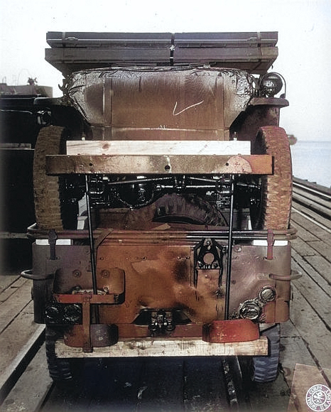 Double stacked Jeeps packed for transport on Liberty Ship SS Esek Hopkins, Pier 2, Hampton Roads, Virginia, United States, Jul 10, 1944 [Colorized by WW2DB]