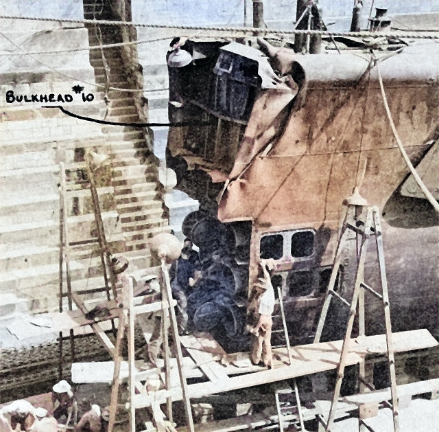 USS Growler’s bow with the damaged sections removed prior to a replacement bow being fitted into place at the South Brisbane Drydock, Brisbane, Queensland, Australia, Apr 1943. Note crumpled sections. [Colorized by WW2DB]