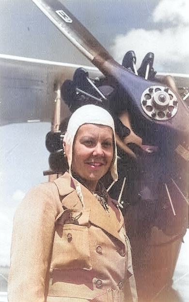 Turkish female aviator Sabiha Gökçen posing in front of a Bre.19 light bomber, 1937-1938 [Colorized by WW2DB]