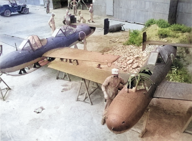 US Navy personnel inspecting MXY7 K-1 Kai training aircraft, Yokosuka, Japan, date unknown [Colorized by WW2DB]