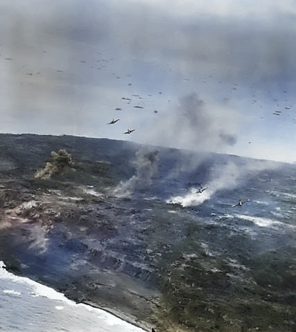 A group of F6F Hellcat fighters supporting ground troops on Iwo Jima, 21 Feb 1945 [Colorized by WW2DB]