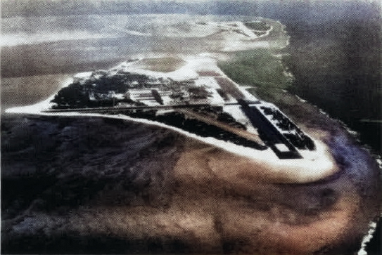 Aerial view of Midway Atoll, date unknown; seen in Jun 1958 issue of US Navy publication Naval Aviation News [Colorized by WW2DB]