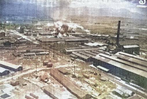 Kagi butanol plant under attack by B-25 bombers of 3rd Bombardment Group, USAAF 5th Air Force, Kagi (now Chiayi), Taiwan, 3 Apr 1945, photo 4 of 5 [Colorized by WW2DB]