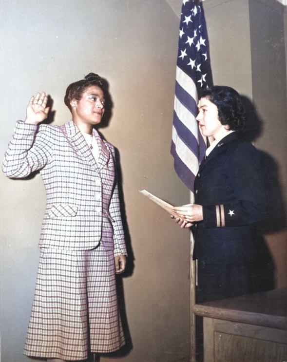 Harriet Ida Pickens being sworn in as WAVES apprentice seamen by Lieutenant Rosamond D. Selle, New York, New York, United States, Nov 1944 [Colorized by WW2DB]