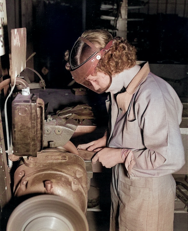 WAVES Aviation Metalsmith 3rd Class Robie Young working at a grinder in the Assembly and Repair Department, Naval Air Station, Seattle, Washington, United States, circa 1943 [Colorized by WW2DB]