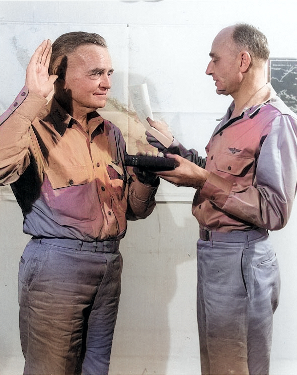 US Navy Admiral William Halsey being sworn in as Commander, South Pacific Force, by his Chief of Staff Captain Miles Browning, 27 Nov 1942 [Colorized by WW2DB]