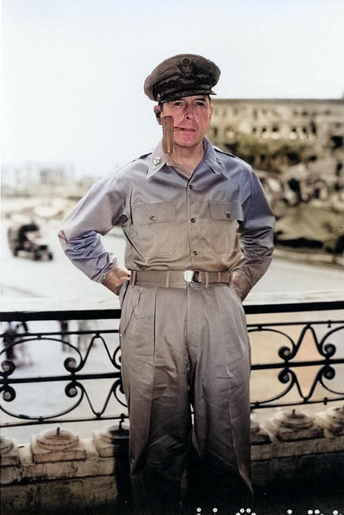 MacArthur smoking his corncob pipe, probably at Manila, Philippine Islands, 2 Aug 1945 [Colorized by WW2DB]