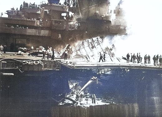 Wreckage of Kiyoshi Ogawa's aircraft after his special attack on USS Bunker Hill, off Okinawa, Japan, 11 May 1945 [Colorized by WW2DB]