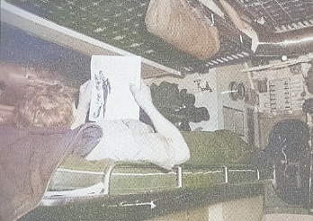 A sailor in his bunk aboard USS Harder, date unknown [Colorized by WW2DB]