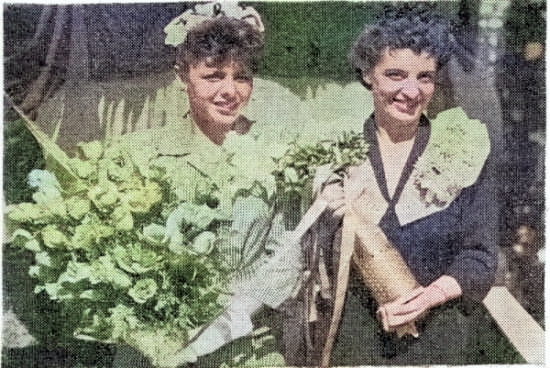 Mrs Cecily Olsen and Mrs A S Pitre at the launching of Tang, Mare Island Navy Yard, Vallejo, California, United States, 17 Aug 1943, as printed in 20 Aug 1943 edition of shipyard newspaper Grapevine [Colorized by WW2DB]