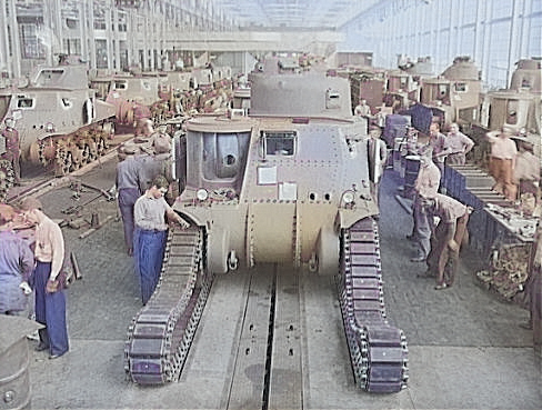 Workers putting tracks onto a M3 tank at the Detroit Arsenal Tank Plant, Warren, Michigan, United States, circa 1940-1942, photo 1 of 2 [Colorized by WW2DB]