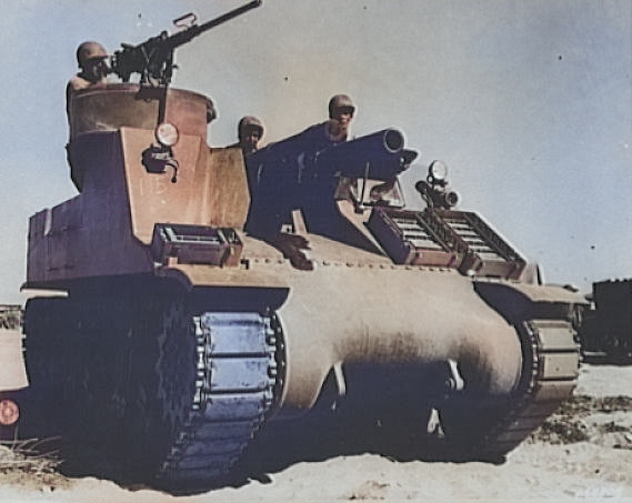 M7 self-propelled artillery vehicle being tested for desert warfare near Iron Mountain, California, United States, circa 1940; the men were Corporal Downing (left, manning machine gun), Corporal L. Roberts (center, manning howitzer), and Lieutenant M. Hutchison (right); photo 1 of 2 [Colorized by WW2DB]