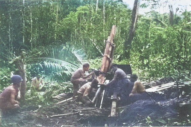 105mm Howitzer M2A1 crew of US 152nd Field Artillery Battalion on New Georgia, Solomon Islands, 1943 [Colorized by WW2DB]