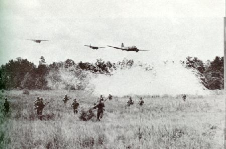 C-47 Skytrain aircraft towing two CG-4A gliders during a training exercise, date unknown