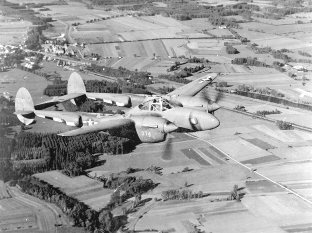 F-5E-2-LO Lightning reconnaissance aircraft of the 31st Photo Reconnaisance Squadron in flight over France, Jul-Dec 1944