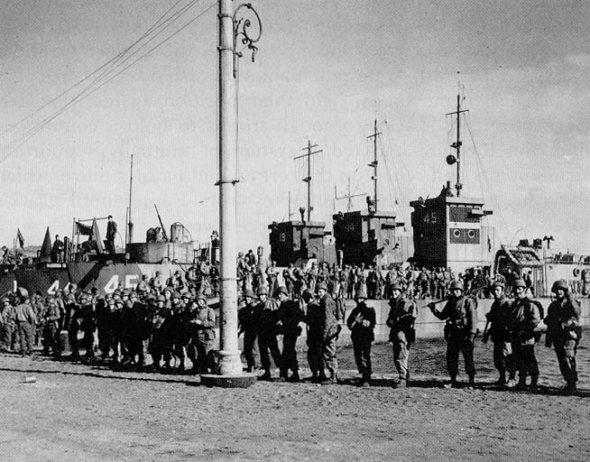 Men of US 3rd Ranger Battalion boarding LCI craft in preparation for Anzio, Italy invasion, Jan 1944; seen in US Army publication US Army Special Operations in World War II