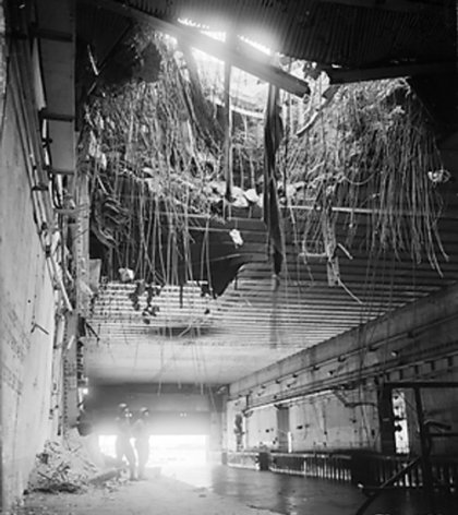 A forty-foot circle hole in the roof of a U-boat pen in Brest, France which had received a direct hit during the Allied bombardment, 18 Sep 1944