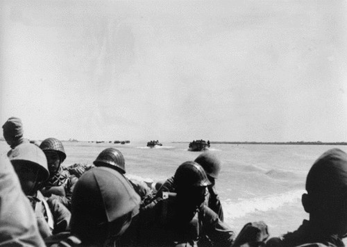 Troops of Japanese 5th Division aboard a landing craft off Guangzhou, Guangdong Province, China, 1938