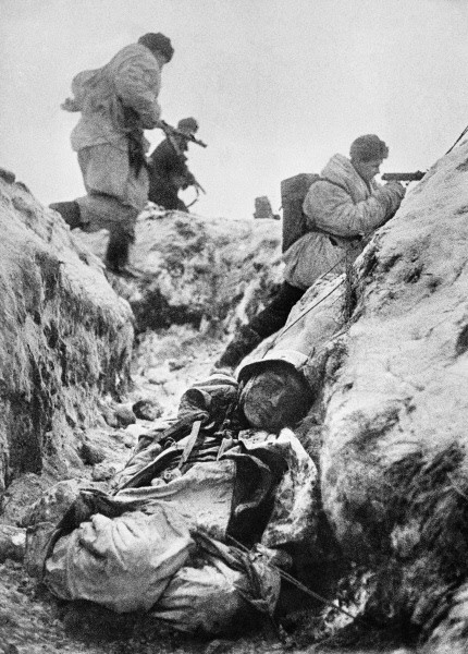 Body of Colonel A. L. Bondareva of Soviet 168th Infantry Division in a trench at Leningrad, Russia, late 1941