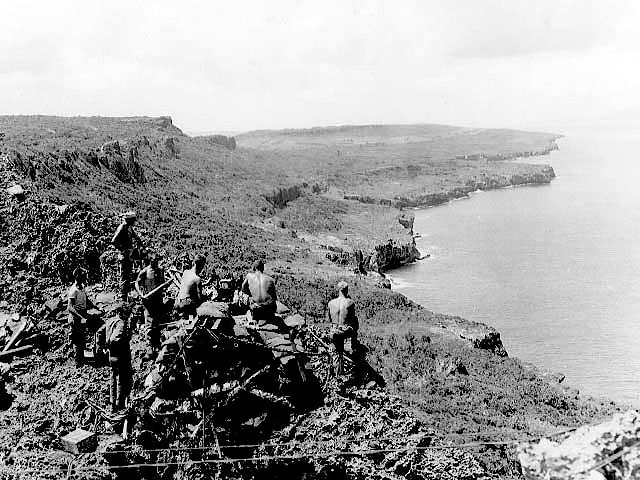 American howitzer 'Miss Connie E' with its US Marine crew, Tinian, Mariana Islands, 25 Aug 1944