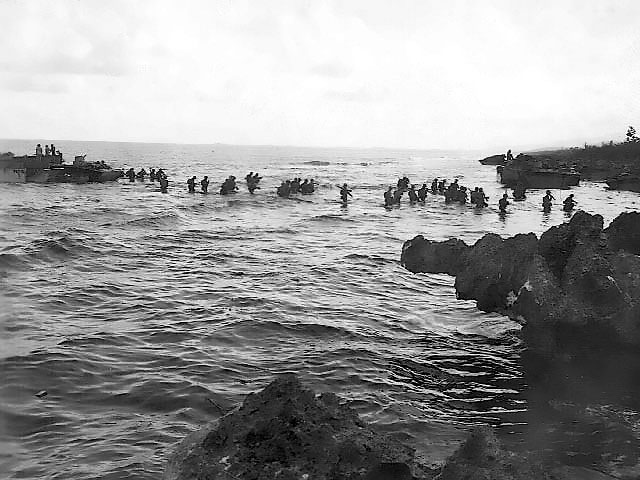 American reinforcements wading onto Tinian, Mariana Islands, Jul 1944