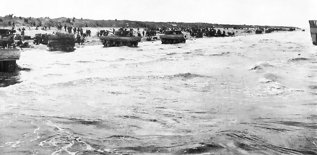 Men of Force U assaulting Utah Beach, Normandy, France, 6 Jun 1944; note duplex-drive tanks