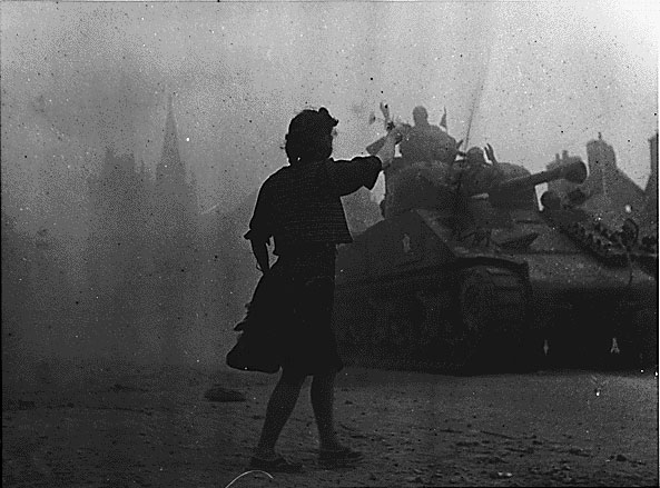 A French woman welcomed American and French troops, Alençon, Basse-Normandie, France, 14 Aug 1944