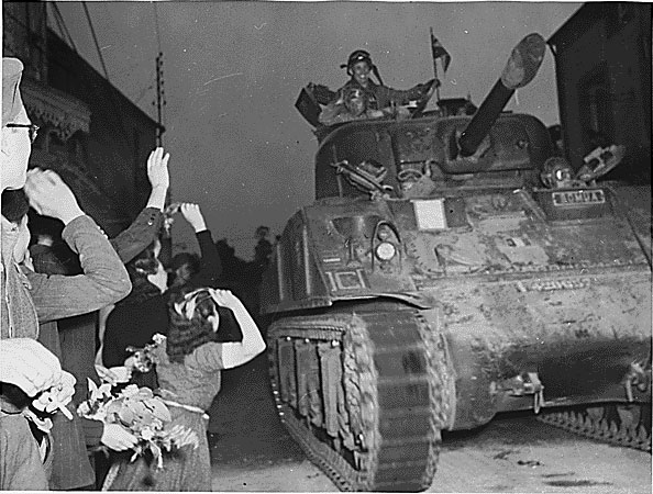 American soldiers welcomed by French citizens, 14 Aug 1944