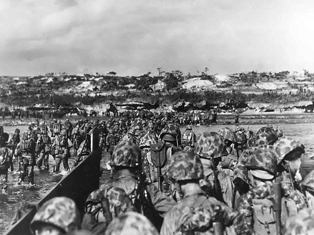 Men of the US 10th Army landing on Okinawa, Japan, 1 Apr 1945