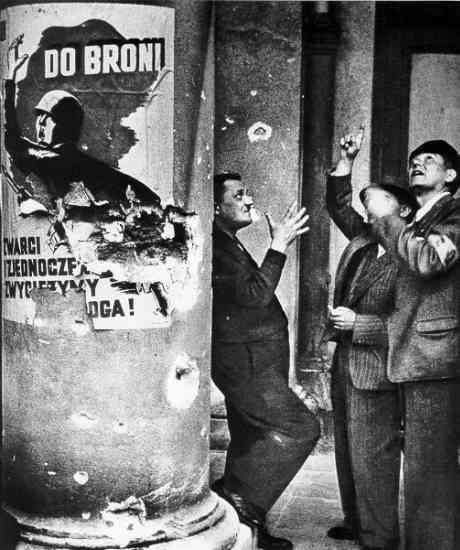 Polish volunteer policemen watching German aircraft in the sky, Grand Theatre, Warsaw, Poland, Sep 1939