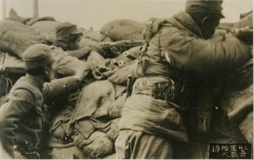 Chinese troops at a roadblock in Shanghai, China, 1932