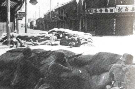 Men of Chinese 88th Division defending a street intersection, Shanghai, China, Sep-Oct 1937