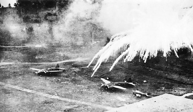 Phosphorus bombs exploding on a Japanese airfield at Rabaul, New Britain, 2 Nov 1943