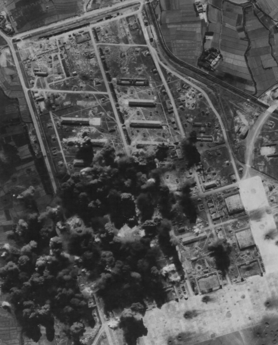 Shinchiku Airfield under B-29 attack, northern Taiwan, 17 Jan 1945, photo 2 of 3