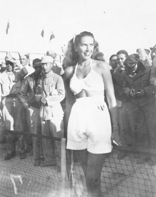 Actress Eugenia 'Jinx' Falkenberg entertaining US and Chinese servicemen at Yangkai Airfield, Yunnan Province, China, 1944