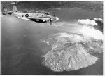 A Ventura patrol aircraft of the Royal New Zealand Air Force overflies Rabaul, New Britain, 1944-1945.