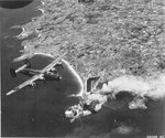 B-24J Liberators of the 565th Bomb Squadron bomb targets in St Malo, France, Aug 13 1944. The aircraft seen here was destroyed the next day when it crash landed and burned at RAF Hethel, Norfolk.