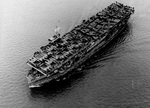 Escort Carrier USS Barnes departing San Diego, California bound for Brisbane, Australia with a deck load of P-38 Lightning and P-47 Thunderbolt fighter planes, July 1 1943.