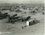 SBD-4 & SBD-5 Dauntlesses join USAAF as A-24A Banshees at Douglas Aircraft Co’s El Segundo Plant, Mar 16 1943. Note two experimental XSB2D-1 torpedo bomber prototypes against the back fence 3 weeks before its maiden flight.