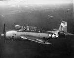 TBM-3 Avenger of Torpedo Squadron 6 flying from USS Hancock flies over ships of Task Force 58 around Okinawa, Mar-Aug 1945