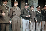 Brigadier General Jesse Auton, General Dwight Eisenhower, Lieutenant General Carl Spaatz, Major General James Doolittle, Major General William E. Kepner, Colonel Donald M. Blakeslee, RAF Debden, Essex, England, United Kingdom, 11 Apr 1944. VIPs were present for the presentation of Blakeslee with the Distinguished Service Cross