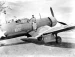 2Lt Harry S Huidekoper, USMCR of VMF-213 poses aboard the hulk of F4U-1 Corsair “George,” Munda Airstrip, New Georgia, Solomon Islands, Sept 1943. This aircraft previously flew with VMF-122.