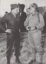 Marine Brigadier General Chesty Puller (helmet) speaks with Col Lew Walt during a training exercise at Camp Pendleton, California, 1952.