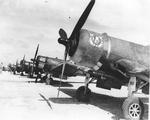 F4U Corsairs of Marine Squadron VMF-222, Guiuan Airfield, Samar, Philippines, 1945. Note the oversized squadron decals on the cowls.