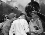 USMC PBJ Mitchell pilot Maj Sidney Groff, right, adds the name of Japanese POW 2Lt Minoru Wada to the flight manifest at Libby Field in Davao, Mindanao for transfer to Moret Field, Zamboanga, Philippines, Aug 7, 1945